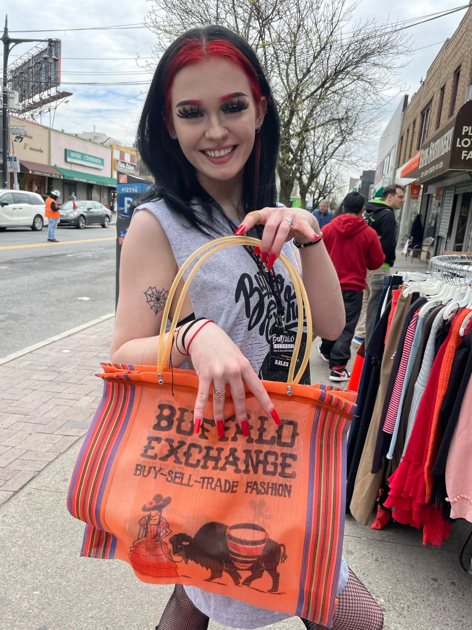 Customer checking out at the Earth Day $1 Sale