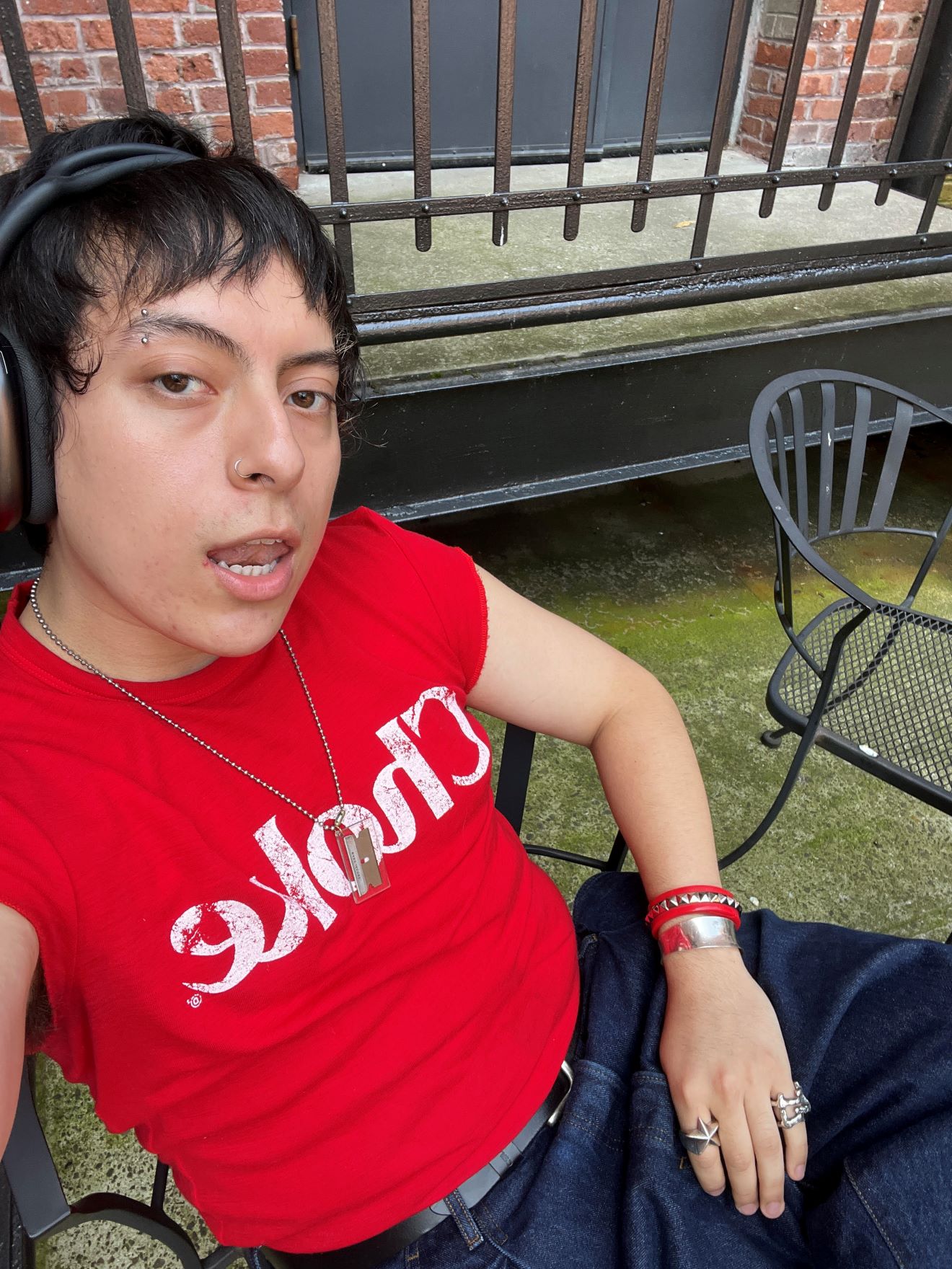 Hugo posing with a red shirt