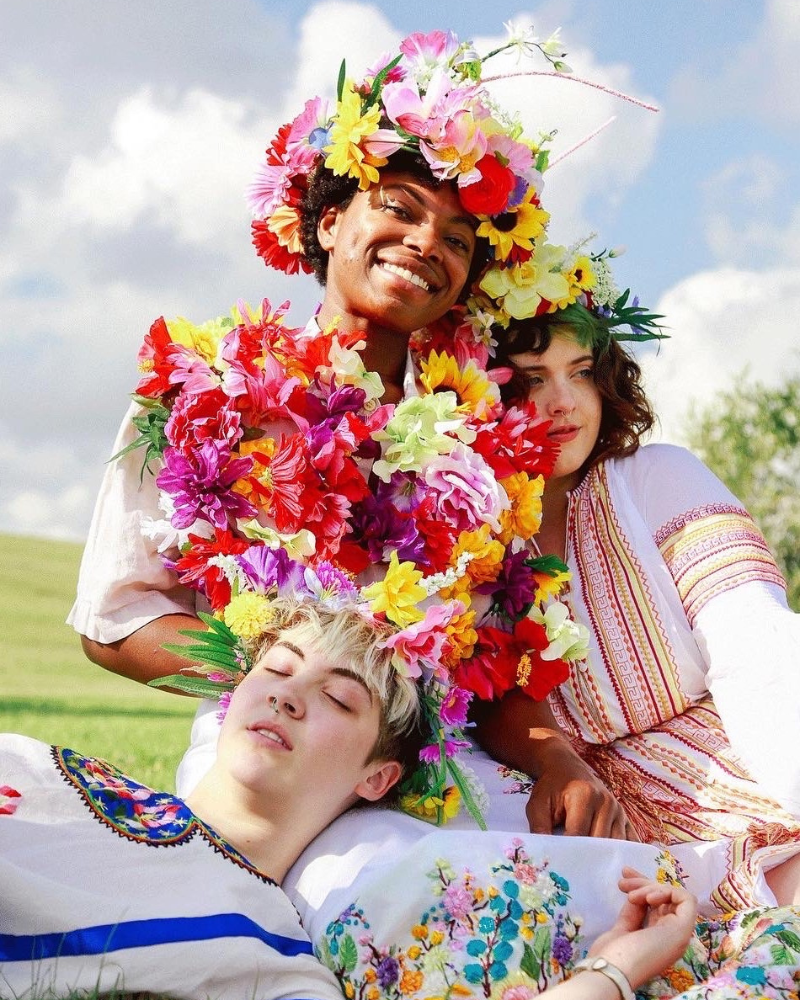 Midsommar group Halloween costume with people wearing faux flowers